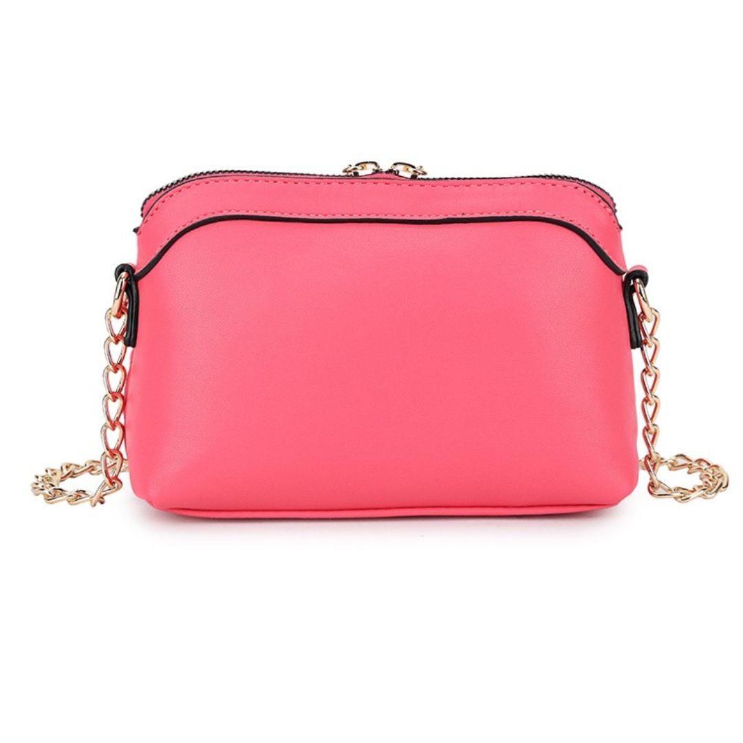 Craze London Women's handbags - Small, embossed with tassels, and designed for crossbody or shoulder wear.