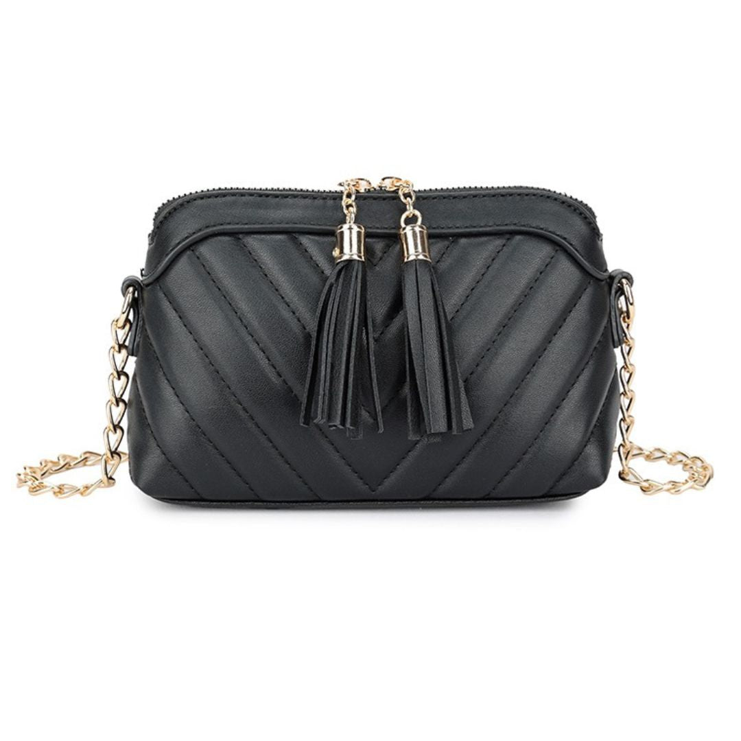 Craze London Women's handbags - Small, embossed with tassels, and designed for crossbody or shoulder wear.