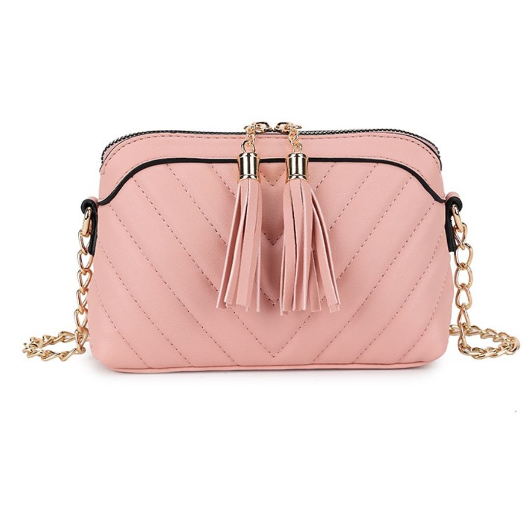 Craze London Women's handbags - Small, embossed with tassels, and designed for crossbody or shoulder wear.