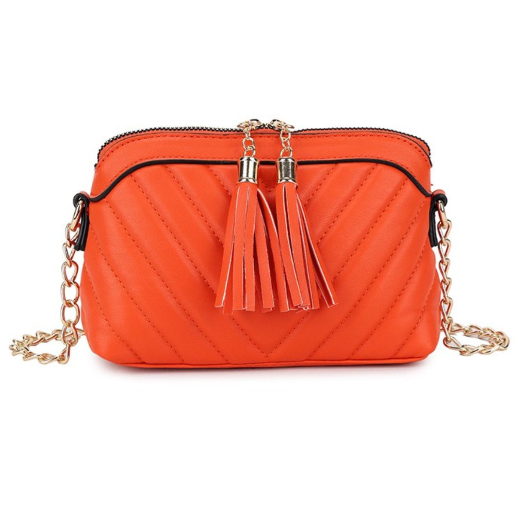 Craze London Women's handbags - Small, embossed with tassels, and designed for crossbody or shoulder wear.
