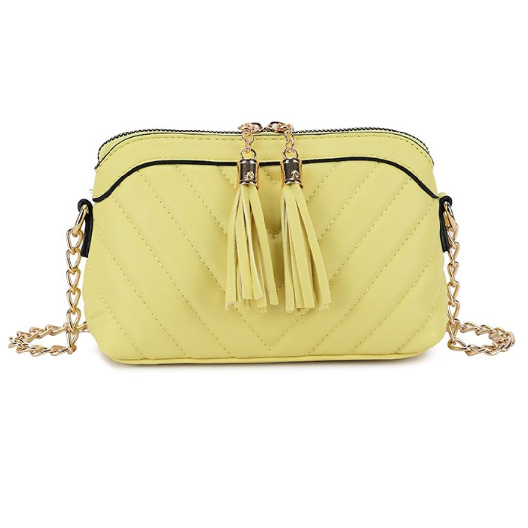 Craze London Women's handbags - Small, embossed with tassels, and designed for crossbody or shoulder wear.